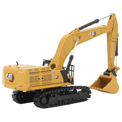 A yellow CAT model 395 excavator with black tracks and a yellow bucket, photographed on a clean white background.