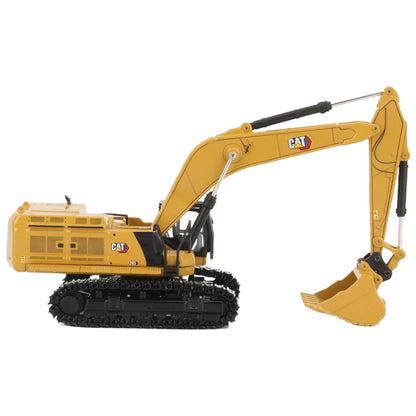 A yellow CAT model 395 excavator with black tracks and a yellow bucket, photographed on a clean white background.