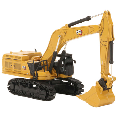 A yellow CAT model 395 excavator with black tracks and a yellow bucket, photographed on a clean white background.