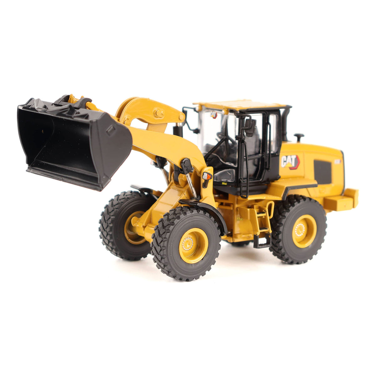 1:50th Scale Diecast Model of a CAT Yellow & Black Model of a Caterpillar 930 Wheel Loader Photographed on a White Background