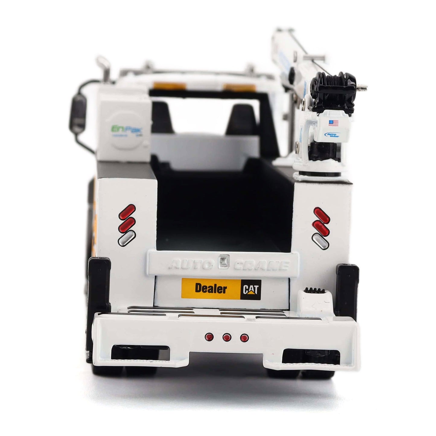 A white diecast metal model of a CAT service truck, viewed from the rear three-quarter angle against a clean white background.