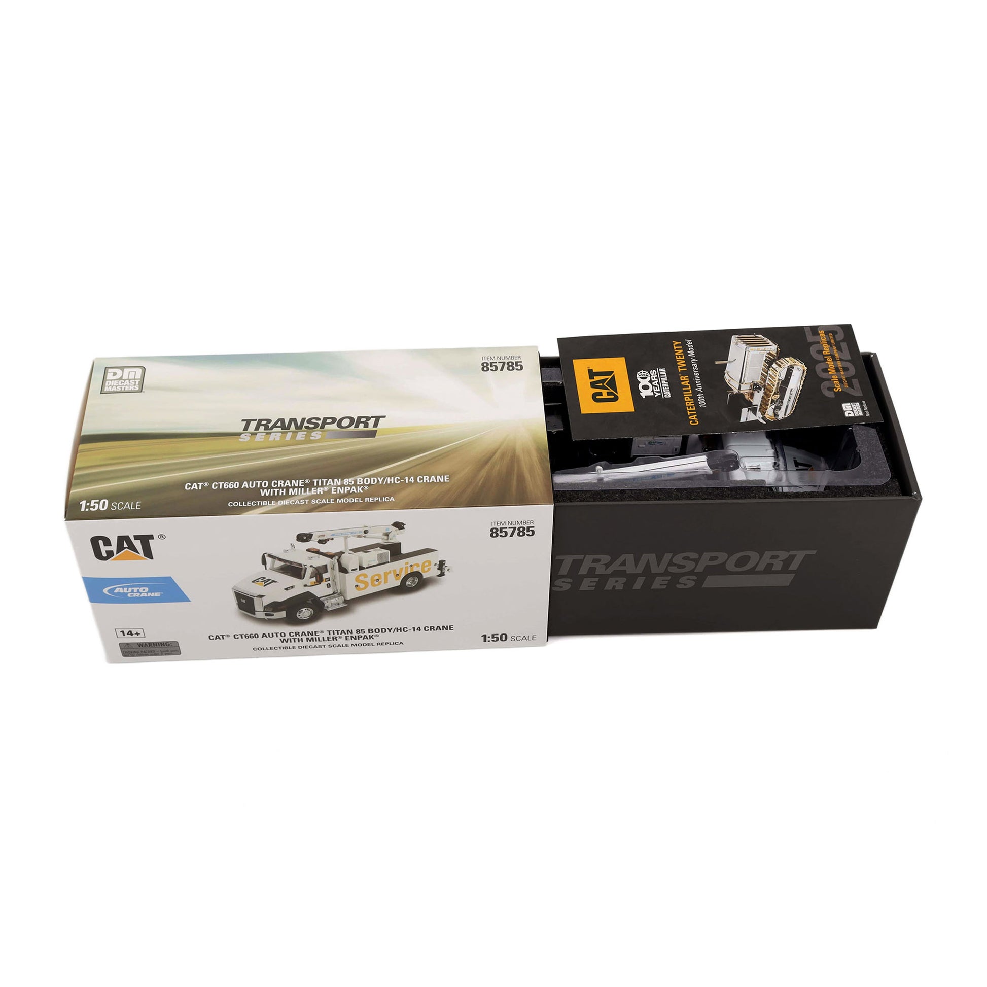 CAT Transport Series 1/50 scale model kit box and display tray for the 85/765 Dump Truck, shown on a white background.