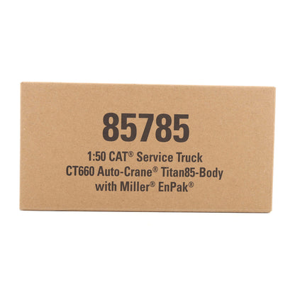 A rectangular brown cardboard box with black printed text reading '85785 1:50 CAT Service Truck CT660 Auto-Crane Titan85-Body with Miller EnPak' on a white background.