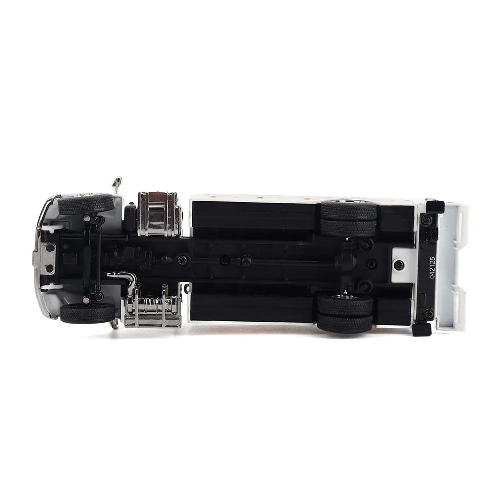 Model of a White Kenworth T380 Auto-Crane Titan 85 Body w/Miller EnPak "Caterpillar Dealer Service" on a White Background