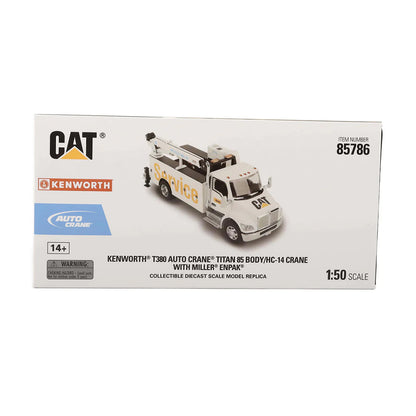 Boxed model of a Kenworth truck with crane, featuring Caterpillar logo.