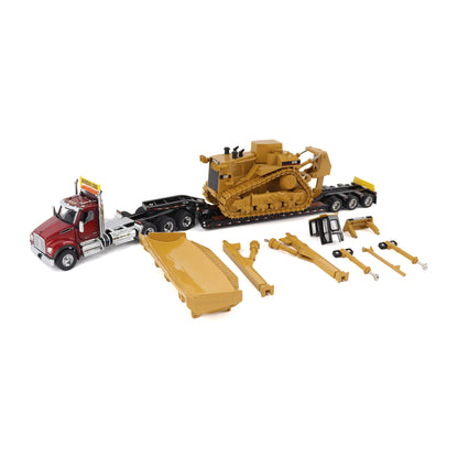A toy construction set featuring a red Kenworth T880 semi-truck, a yellow Caterpillar D11R bulldozer on a black Trail King TK120 lowboy trailer, a large yellow blade, and several small yellow and black accessory pieces, all arranged on a white background.