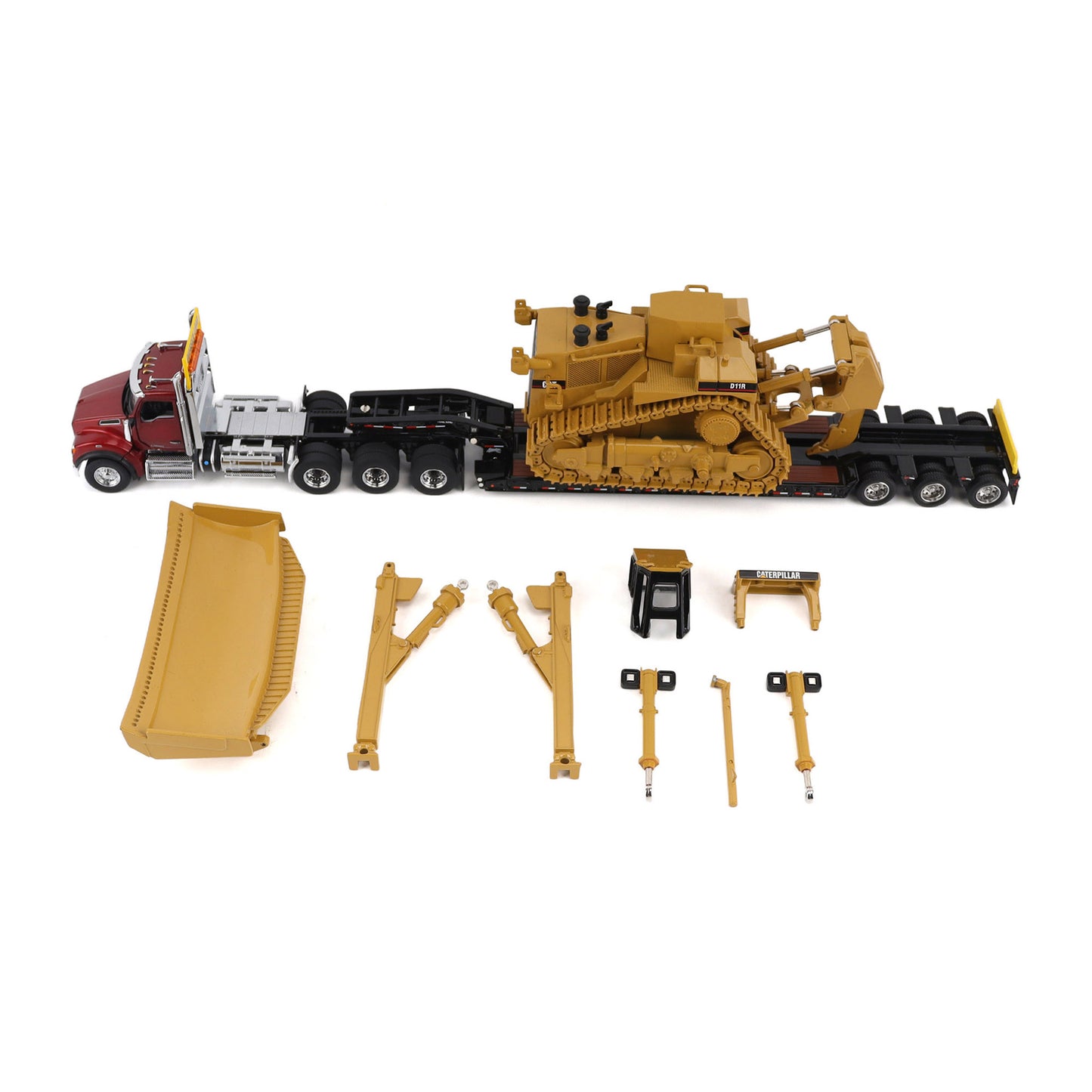 A toy construction set featuring a red Kenworth T880 semi-truck, a yellow Caterpillar D11R bulldozer on a black Trail King TK120 lowboy trailer, a large yellow blade, and several small yellow and black accessory pieces, all arranged on a white background.