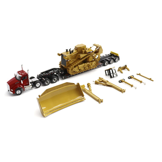 A toy construction set featuring a red Kenworth T880 semi-truck, a yellow Caterpillar D11R bulldozer on a black Trail King TK120 lowboy trailer, a large yellow blade, and several small yellow and black accessory pieces, all arranged on a white background.