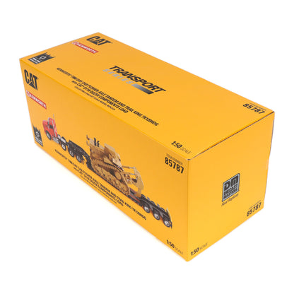 Yellow box packaging of a Caterpillar toy truck model on a white background