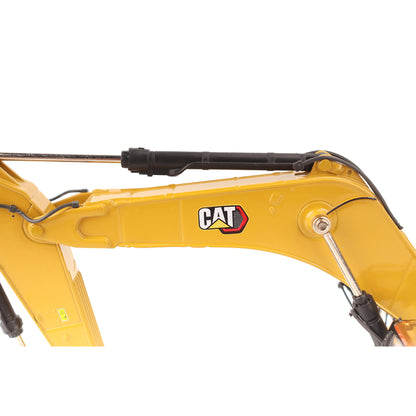 1:50th Scale Diecast Model in CAT Yellow & Black of a Caterpillar 374 Excavator Photographed on a White Background