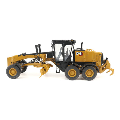 Model of a Caterpillar 140 LVR Motor Grader on a White Background