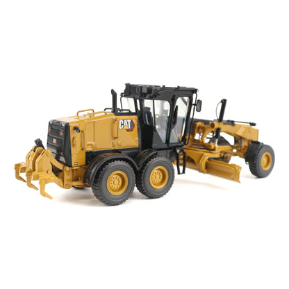 Model of a Caterpillar 140 LVR Motor Grader on a White Background