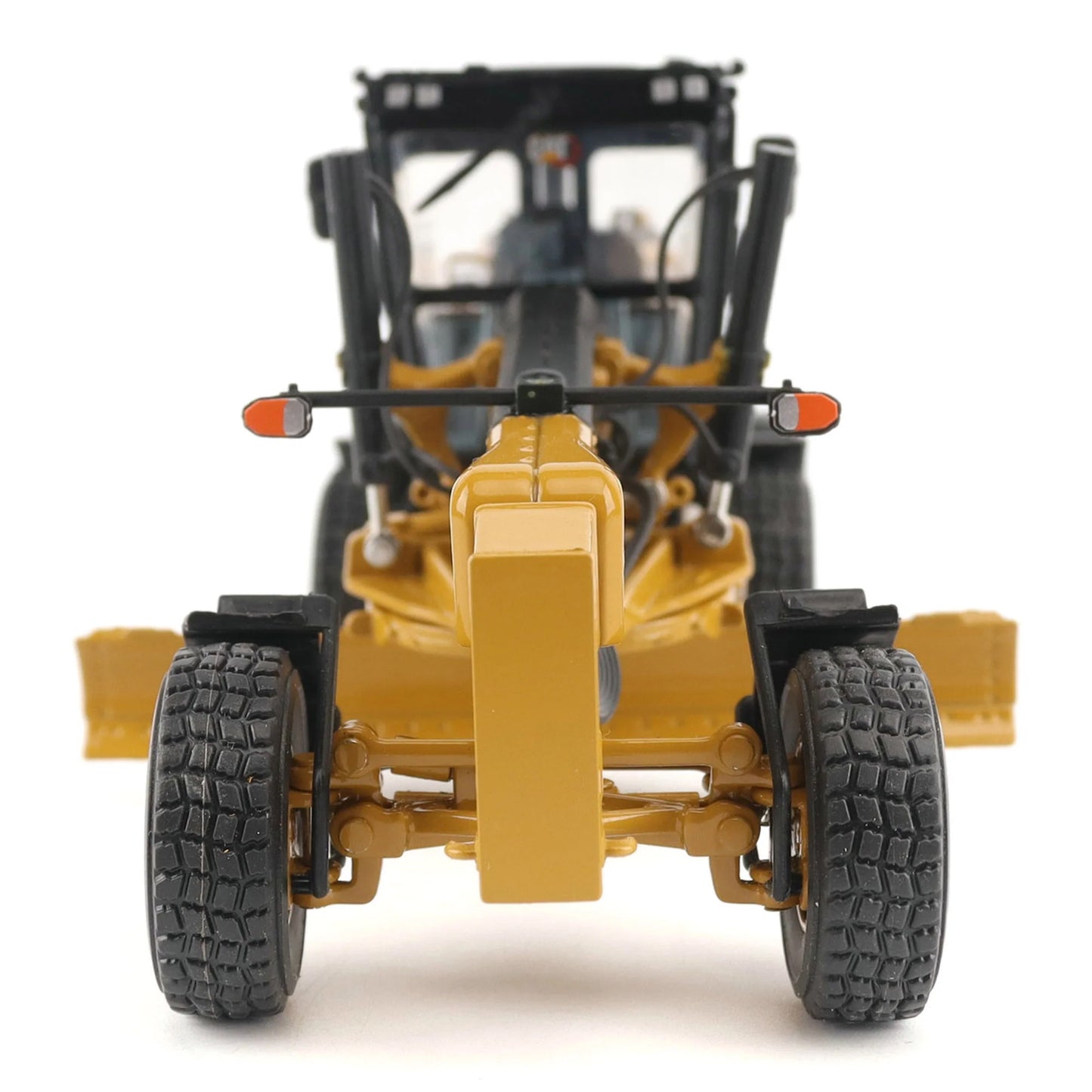 Model of a Caterpillar 140 LVR Motor Grader on a White Background