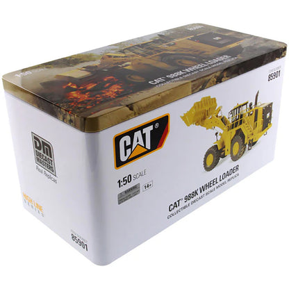 Box packaging of a CAT 988K Wheel Loader model toy on a white background