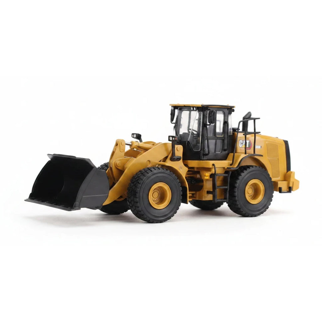 1:50th Scale Model of a CAT Yellow and Black Caterpillar 950M Wheel Loader Photographed on a Clean White Background