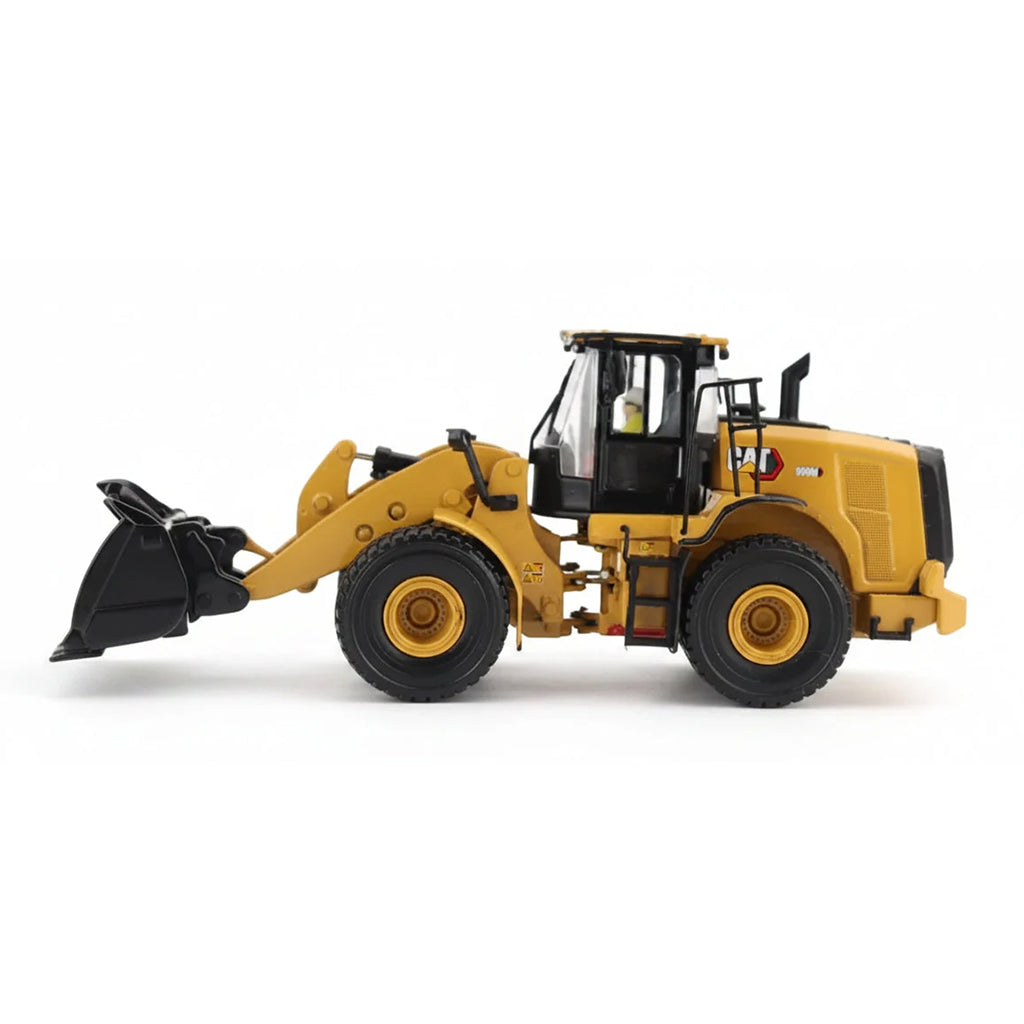 1:50th Scale Model of a CAT Yellow and Black Caterpillar 950M Wheel Loader Photographed on a Clean White Background