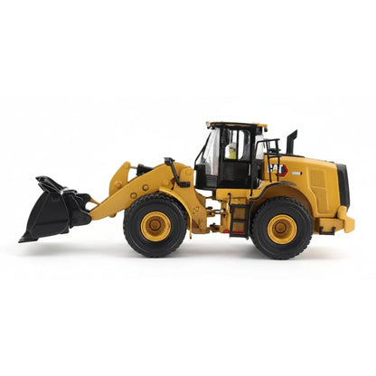 1:50th Scale Model of a CAT Yellow and Black Caterpillar 950M Wheel Loader Photographed on a Clean White Background