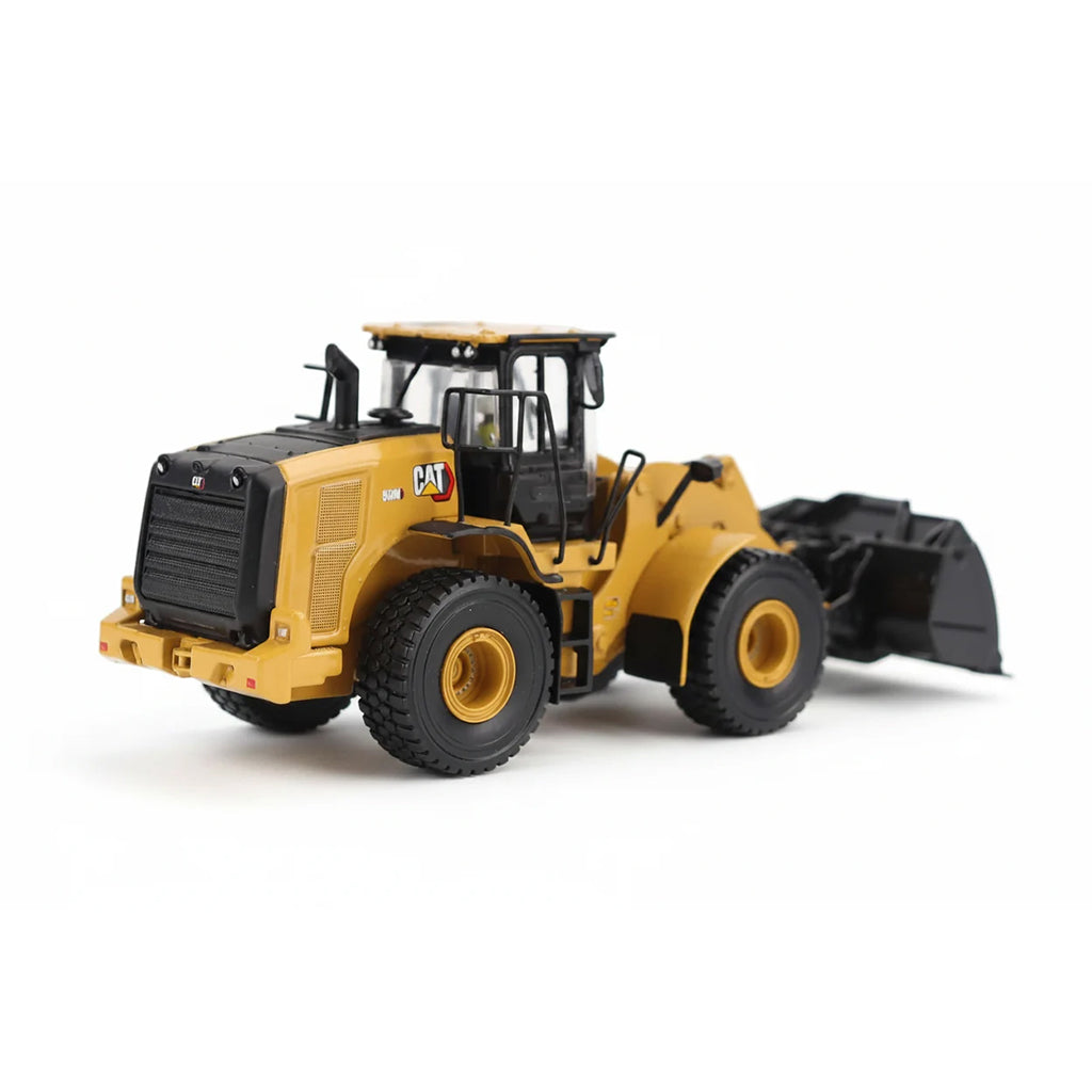 1:50th Scale Model of a CAT Yellow and Black Caterpillar 950M Wheel Loader Photographed on a Clean White Background
