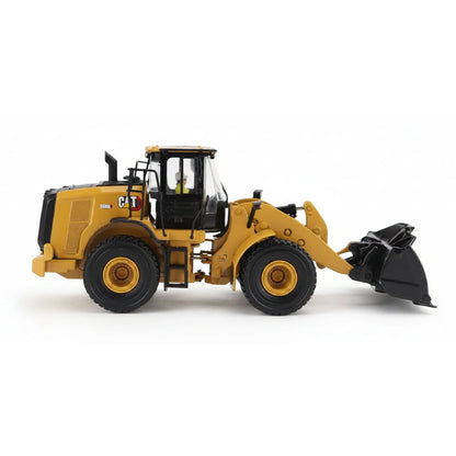 1:50th Scale Model of a CAT Yellow and Black Caterpillar 950M Wheel Loader Photographed on a Clean White Background