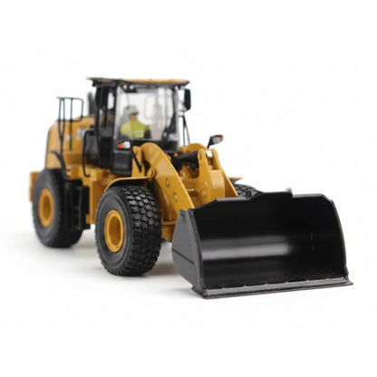 1:50th Scale Model of a CAT Yellow and Black Caterpillar 950M Wheel Loader Photographed on a Clean White Background