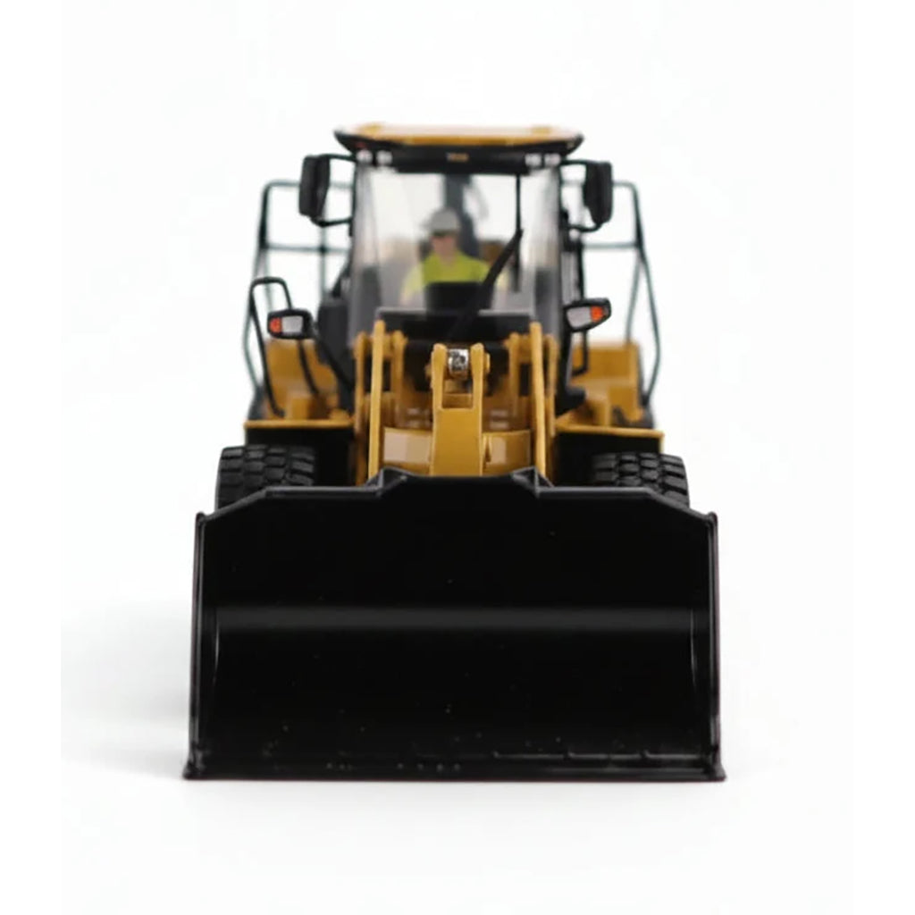 1:50th Scale Model of a CAT Yellow and Black Caterpillar 950M Wheel Loader Photographed on a Clean White Background