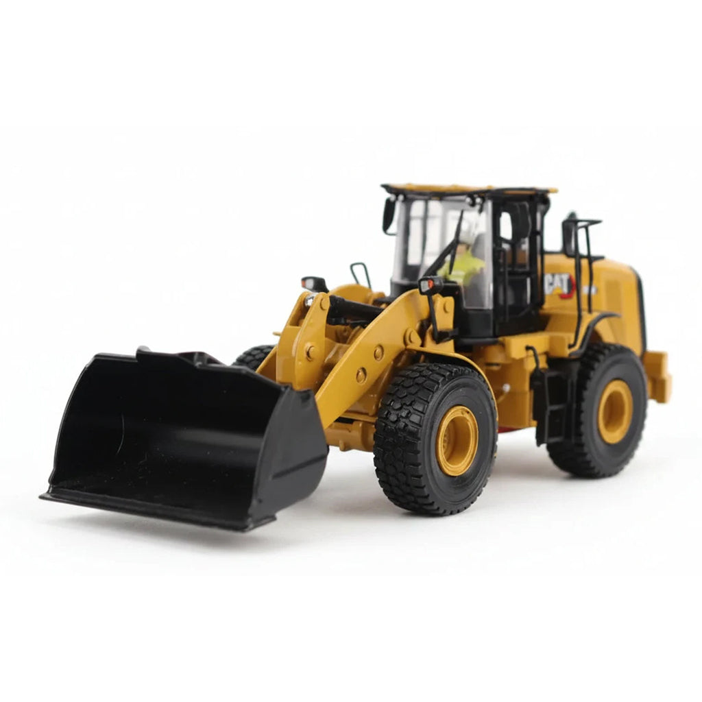 1:50th Scale Model of a CAT Yellow and Black Caterpillar 950M Wheel Loader Photographed on a Clean White Background