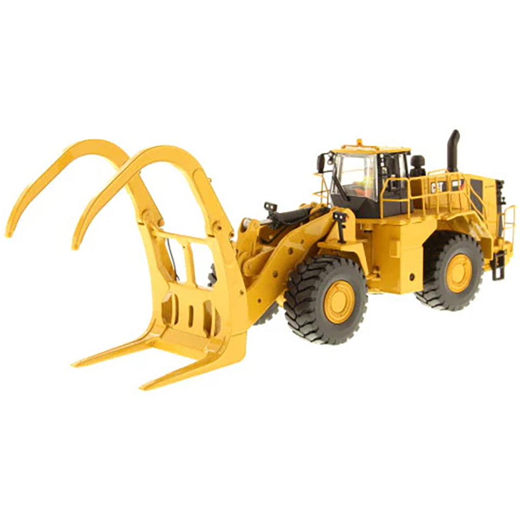 Model of a Caterpillar 988K Wheel Loader w/Log Grapple on a White Background