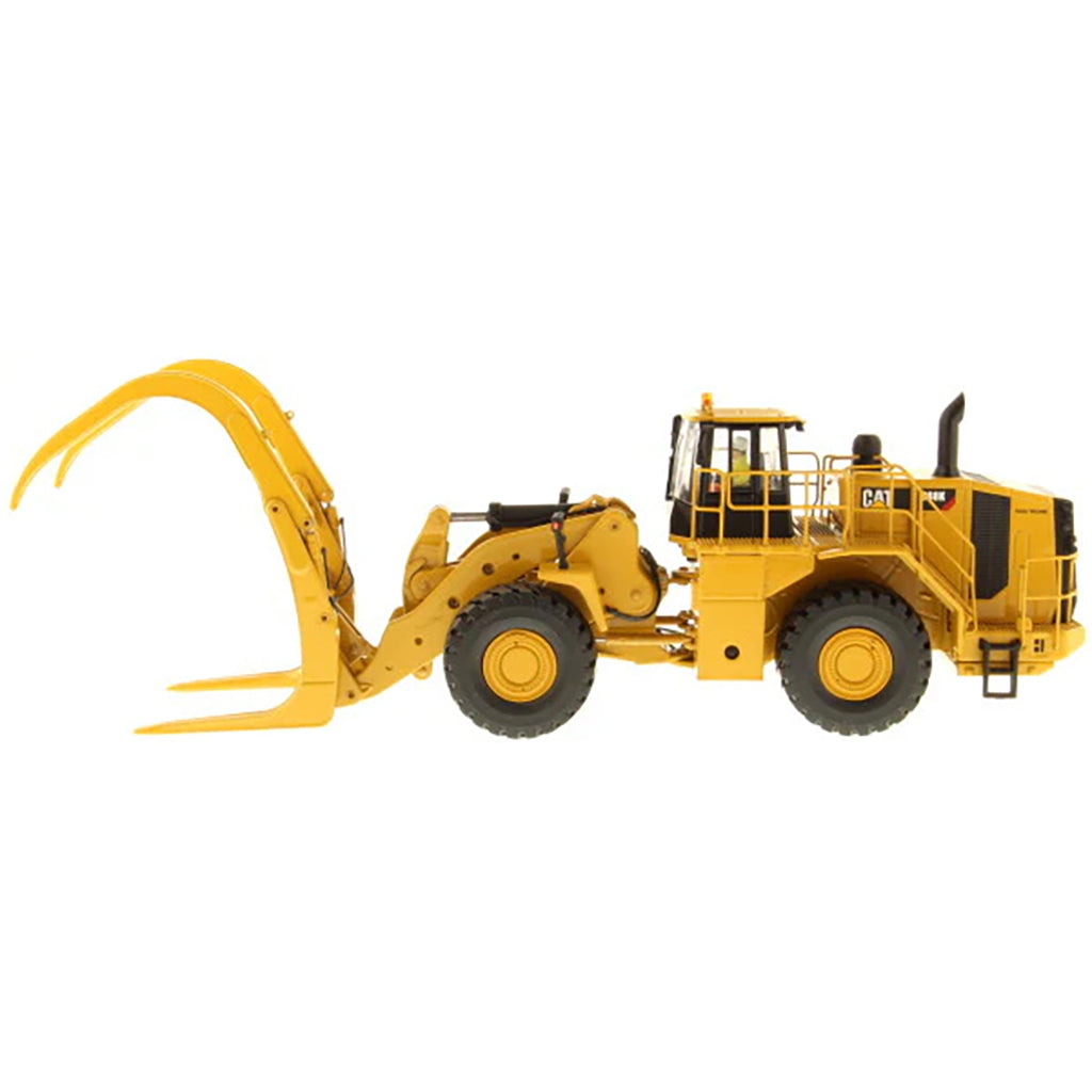 Model of a Caterpillar 988K Wheel Loader w/Log Grapple on a White Background