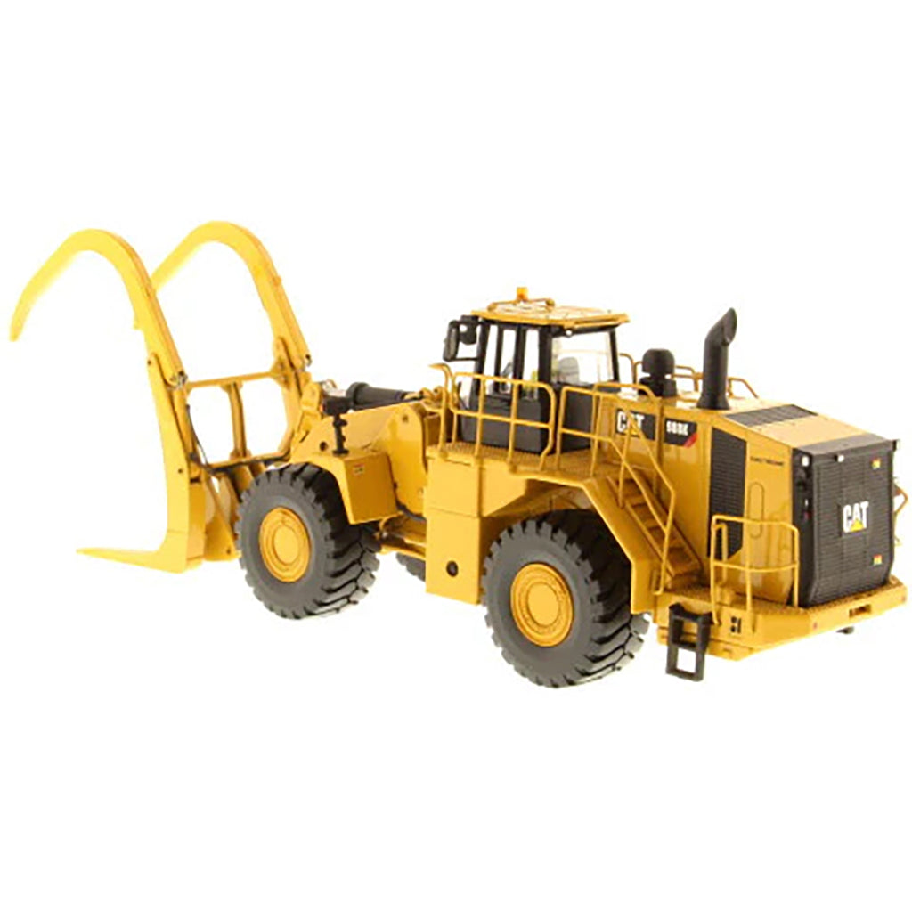 Model of a Caterpillar 988K Wheel Loader w/Log Grapple on a White Background