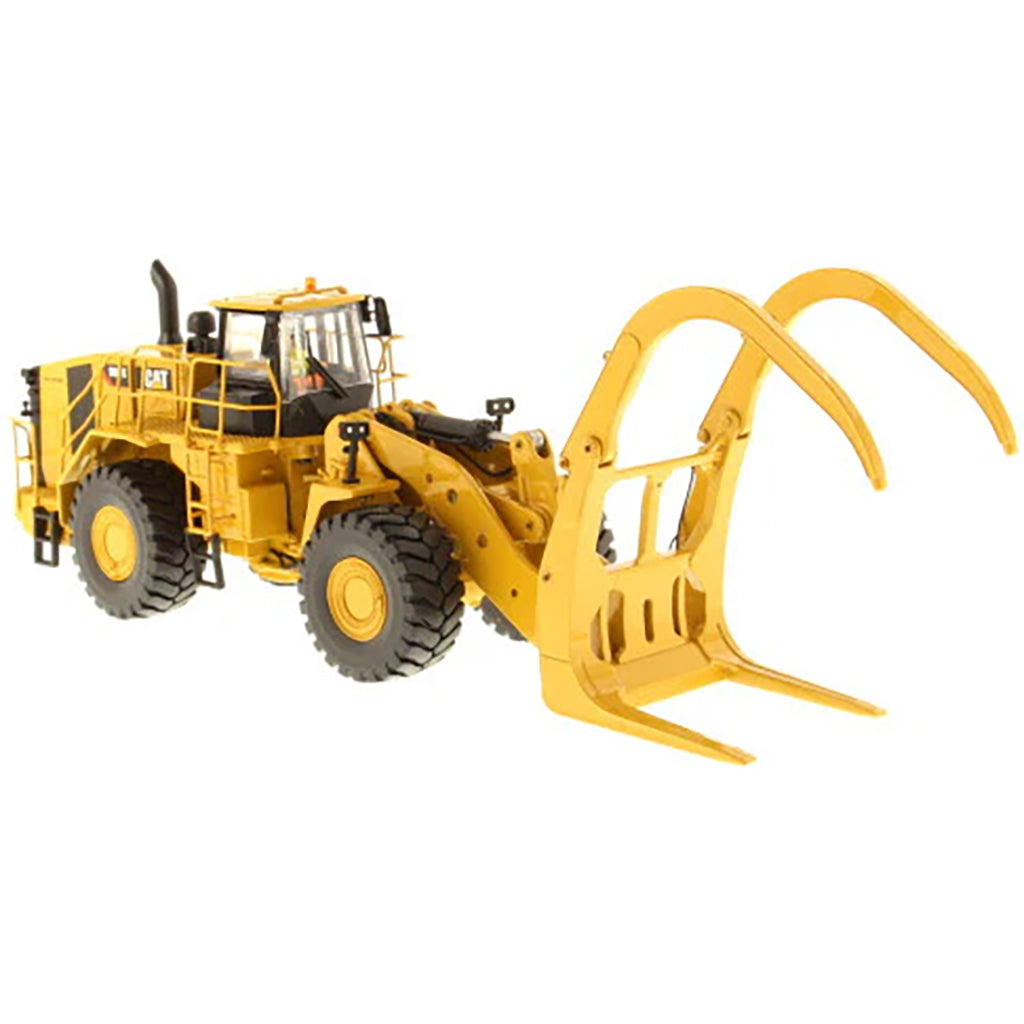 Model of a Caterpillar 988K Wheel Loader w/Log Grapple on a White Background