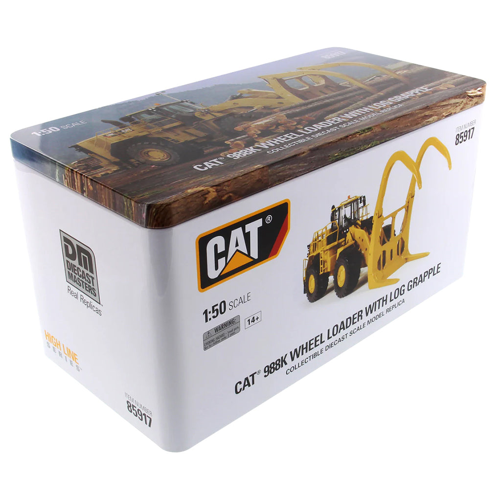 Boxed model of a Caterpillar 988K wheel loader with log grapple on a white background