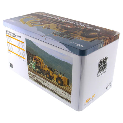 Boxed model of a Caterpillar 988K wheel loader with log grapple on a white background