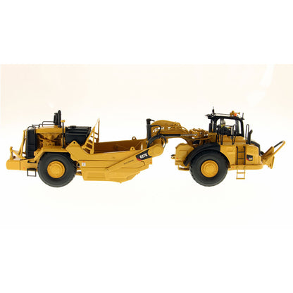 Model of a Caterpillar 627K Wheel Tractor Scraper on a White Background