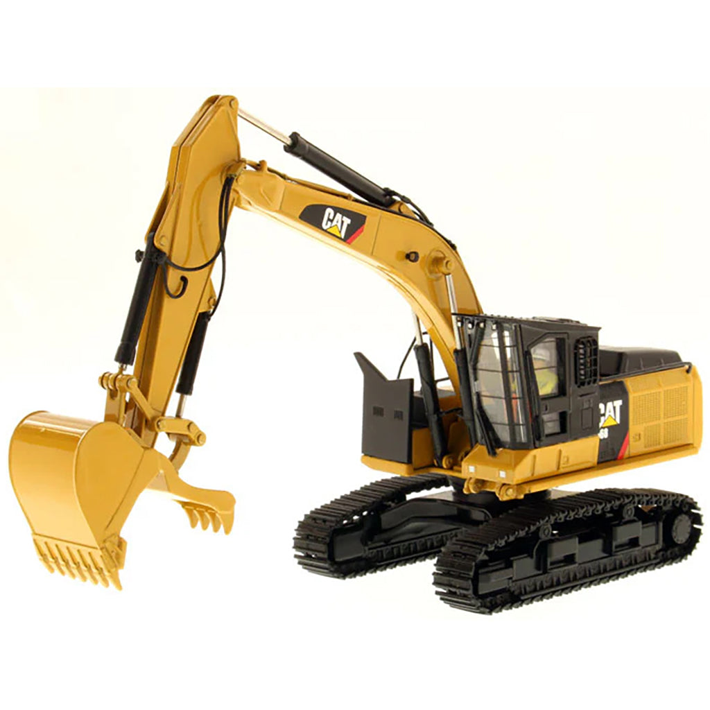 Model of a Caterpillar 568G F Hydraulic Excavator in a Road Builder Configuration with Thumb on a White Background