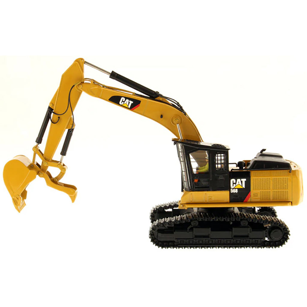 Model of a Caterpillar 568G F Hydraulic Excavator in a Road Builder Configuration with Thumb on a White Background