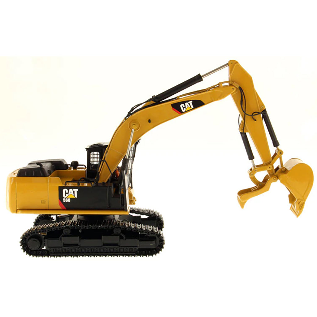 Model of a Caterpillar 568G F Hydraulic Excavator in a Road Builder Configuration with Thumb on a White Background