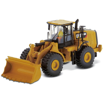 Model of a Caterpillar 966M Wheel Loader on a White Background