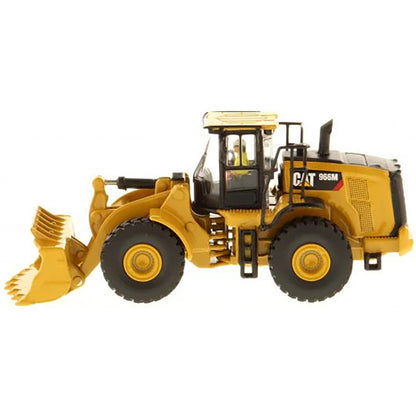 Model of a Caterpillar 966M Wheel Loader on a White Background