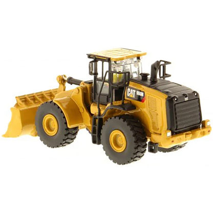Model of a Caterpillar 966M Wheel Loader on a White Background