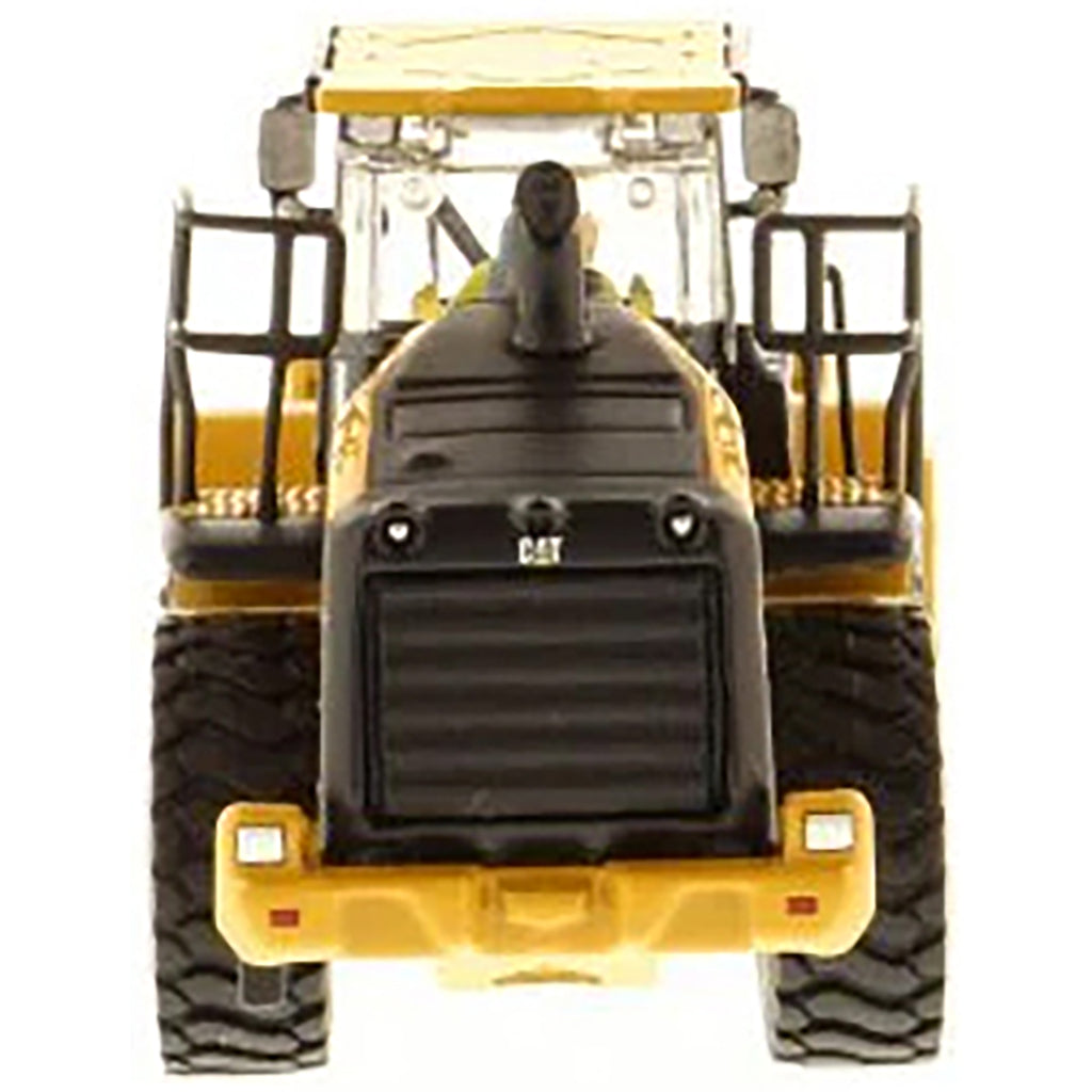 Model of a Caterpillar 966M Wheel Loader on a White Background