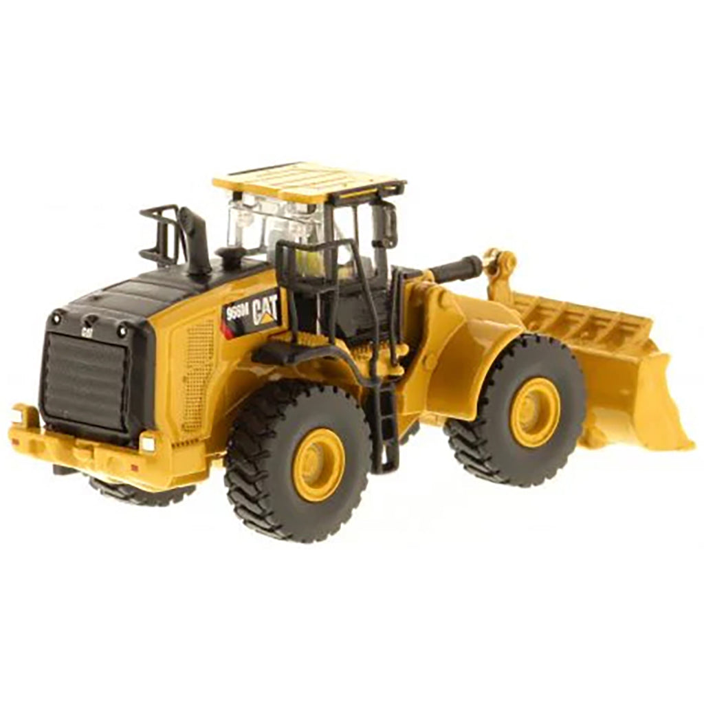 Model of a Caterpillar 966M Wheel Loader on a White Background