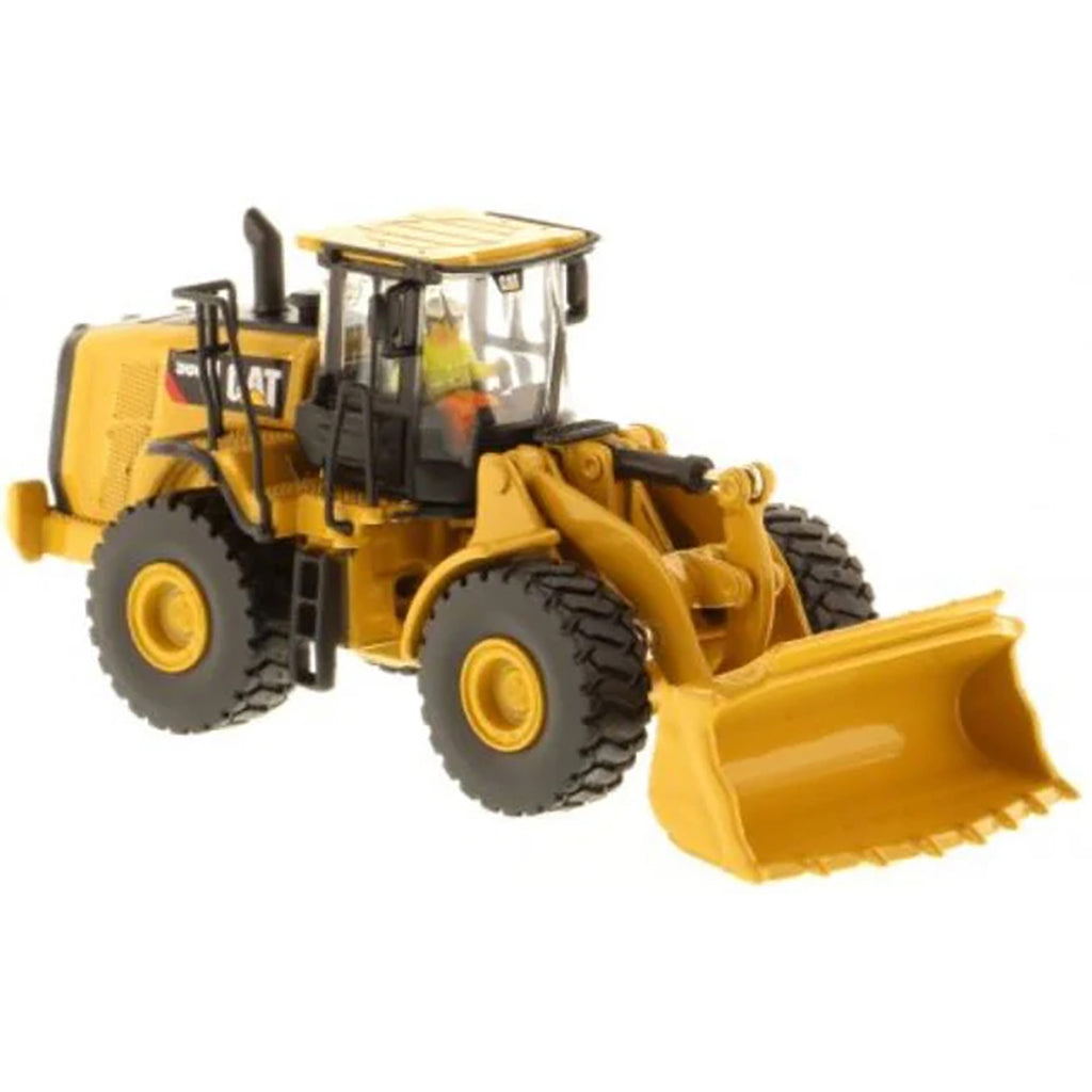 Model of a Caterpillar 966M Wheel Loader on a White Background