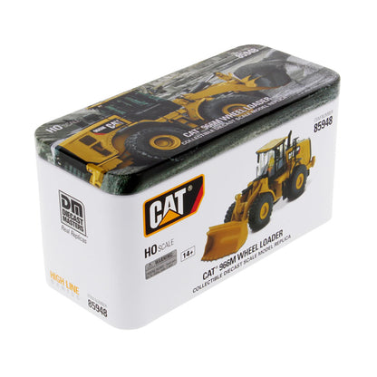Model toy of a Cat 986M wheel loader in packaging on a white background