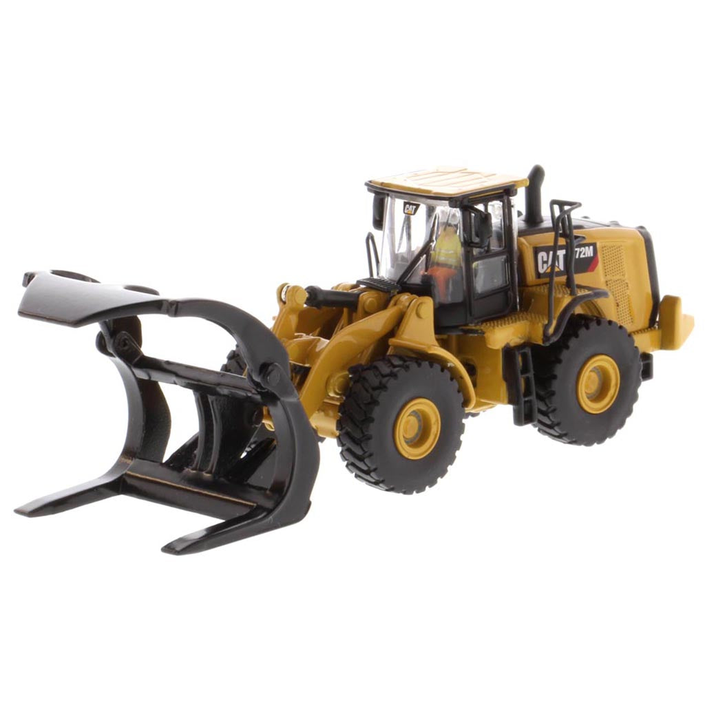 1:50th Scale Diecast Model of a Yellow and Black Caterpillar 972M Wheel Loader with Log Forks on a White Background