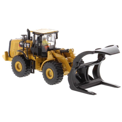 1:50th Scale Diecast Model of a Yellow and Black Caterpillar 972M Wheel Loader with Log Forks on a White Background
