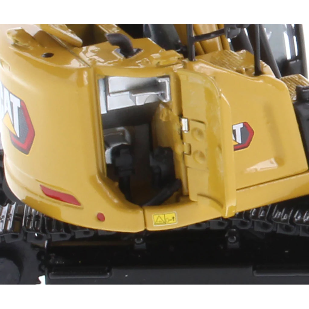 Model of a Caterpillar 315 Mini-Excavator on a White Background