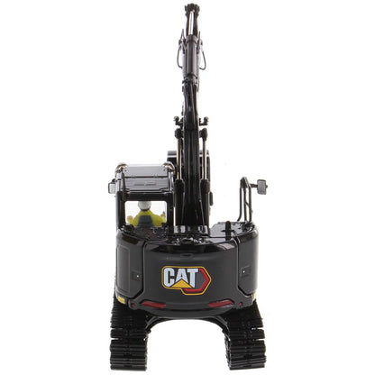 Model of a Caterpillar 315 Mini-Excavator in a Special Black Finish on a White Background