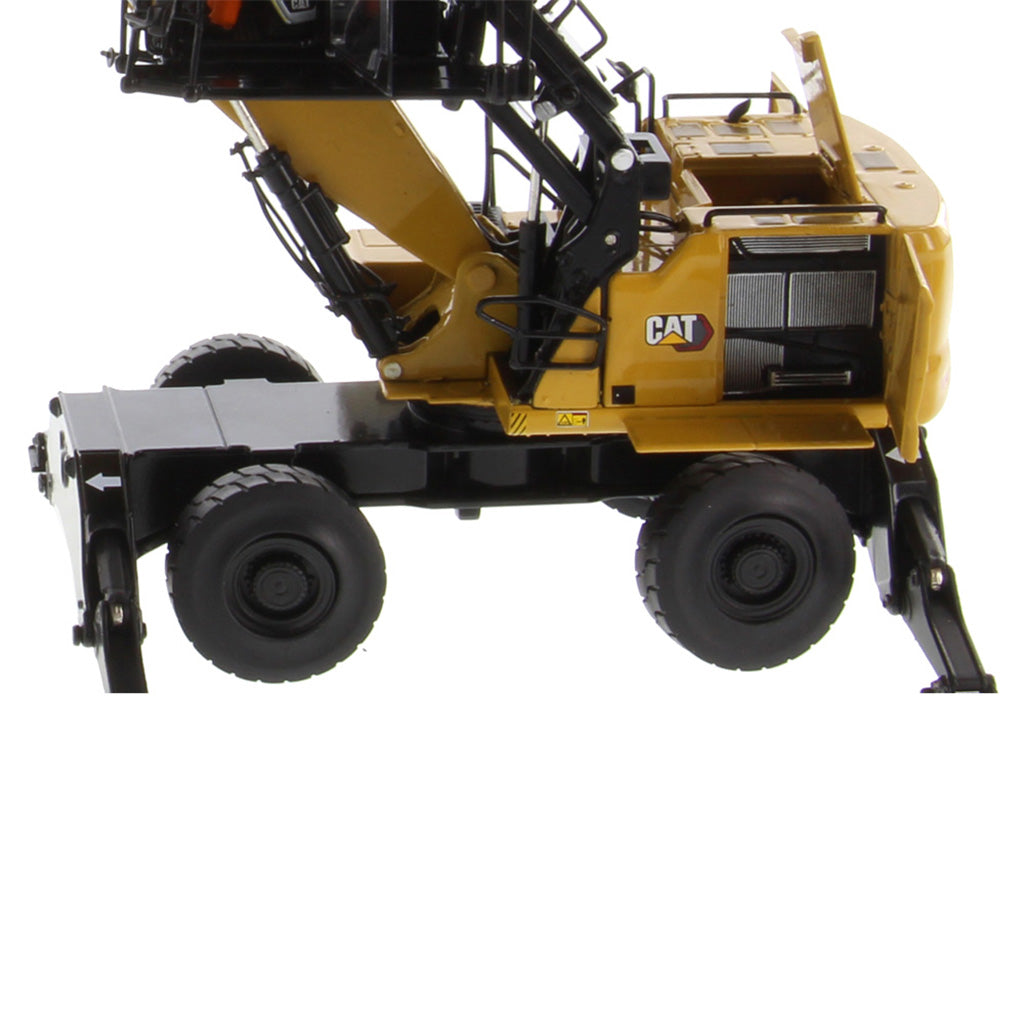 A yellow and black CAT wheeled construction vehicle model shown in side profile against a plain white background.