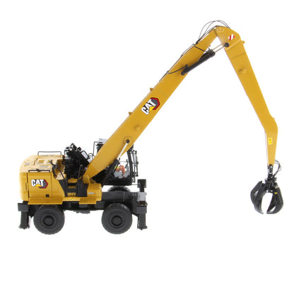 1:50 Scale Model of a Caterpillar MH3040 Material Handler on a White Background