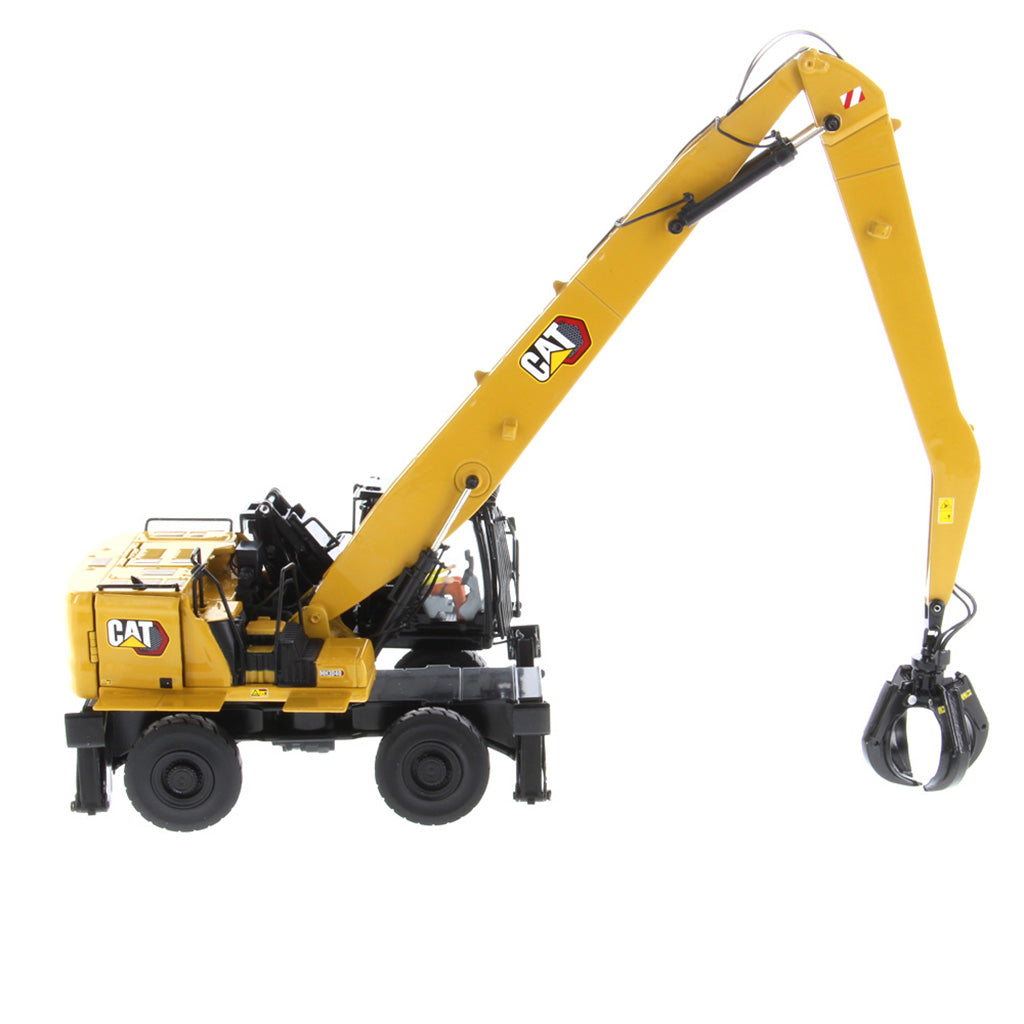 1:50 Scale Model of a Caterpillar MH3040 Material Handler on a White Background